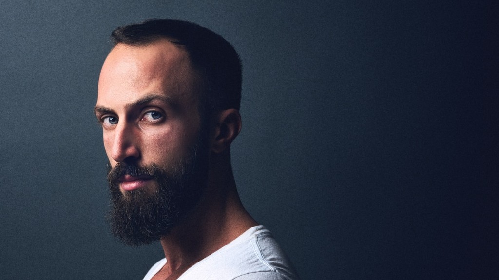Should you trim your beard when growing it out?