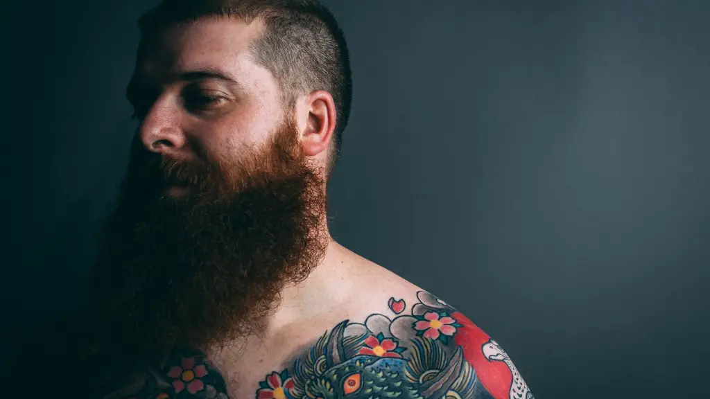 Should you trim your beard when growing it out?