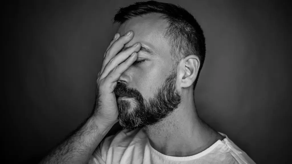 Should you trim your beard when growing it out?